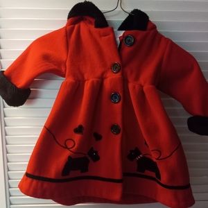 Red and Black Poodle Coat